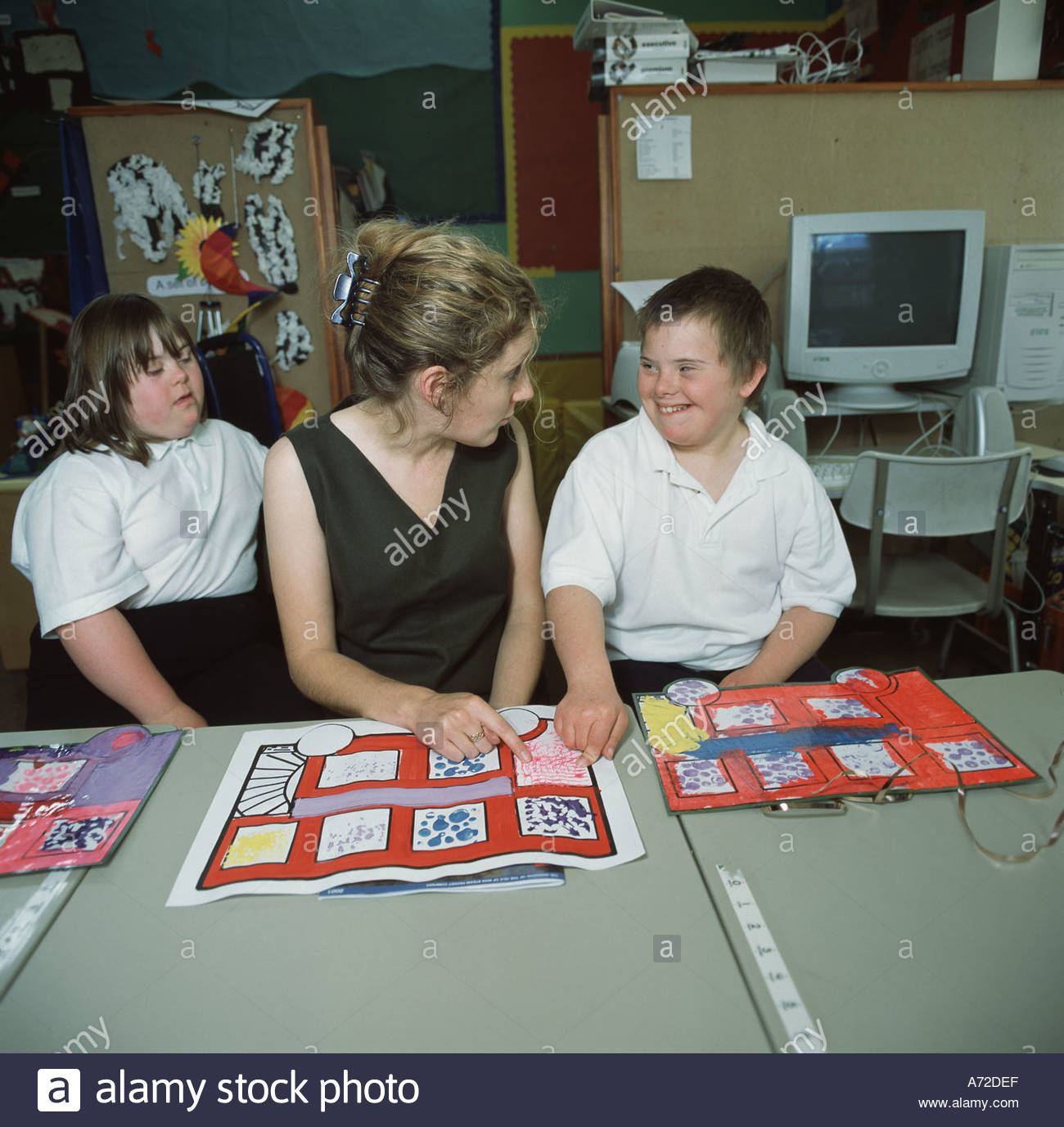 Special needs unit in primary school Downs Syndrome children teacher