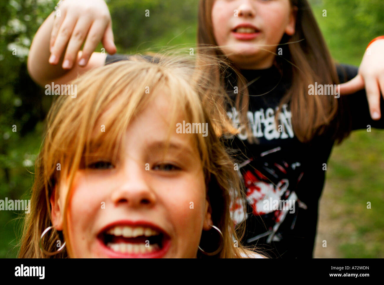 two children playing and messing about Stock Photo