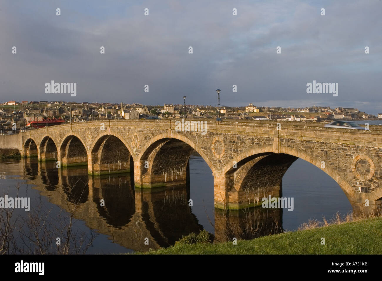 Seven arched road bridge over the River Deveron,  north -east Scotland joining the two towns of Banff and Macduff. UK Stock Photo