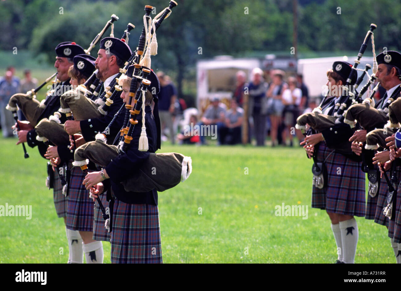 Scots play bagpipe music Stock Photo