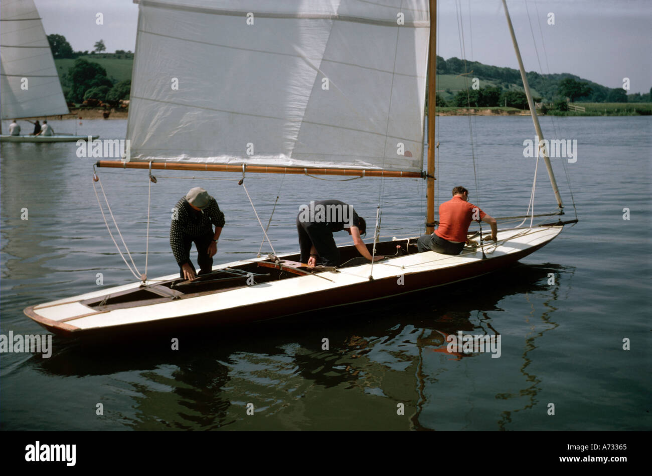 Thames Rater dinghy racing with three man crew at the Upper Thames