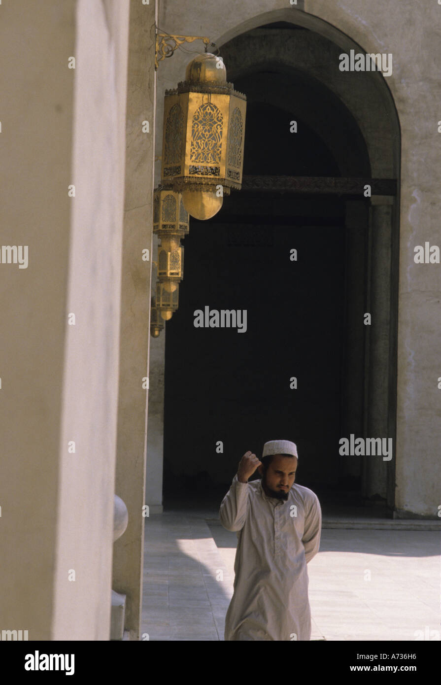 Man praying Hakim Mosque Cairo Stock Photo