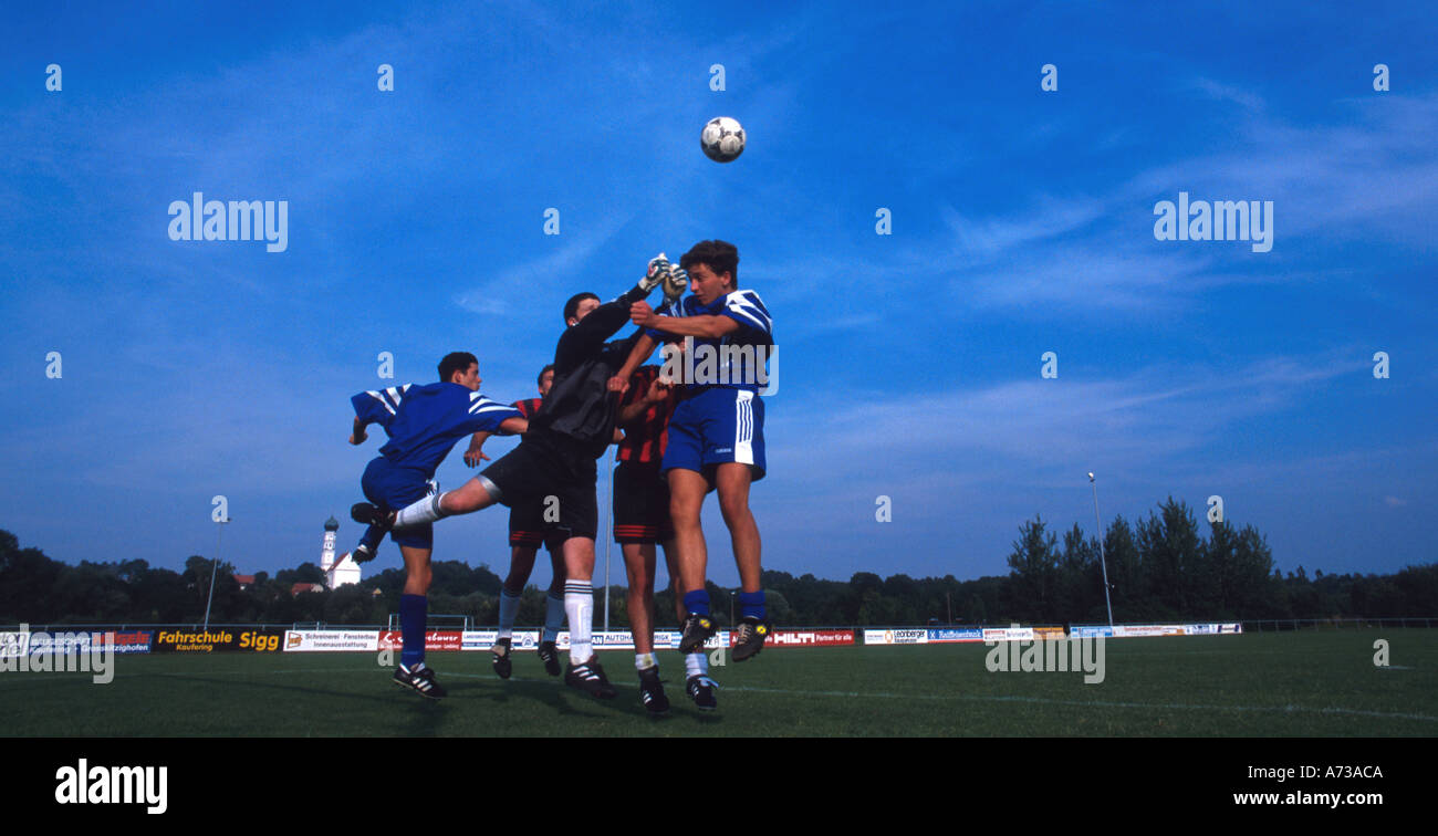 soccer young men playing soccer football young men playing European football Fußbal Stock Photo