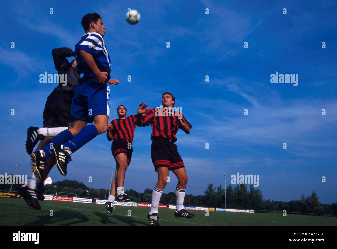 soccer young men playing soccer football young men playing European football Fußbal Stock Photo