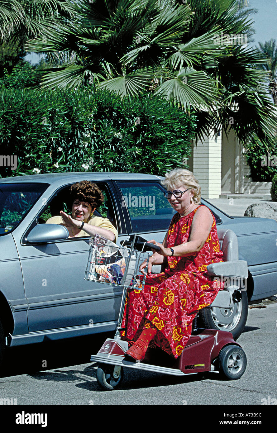 disabled woman  gives directions to motorist in usa Stock Photo