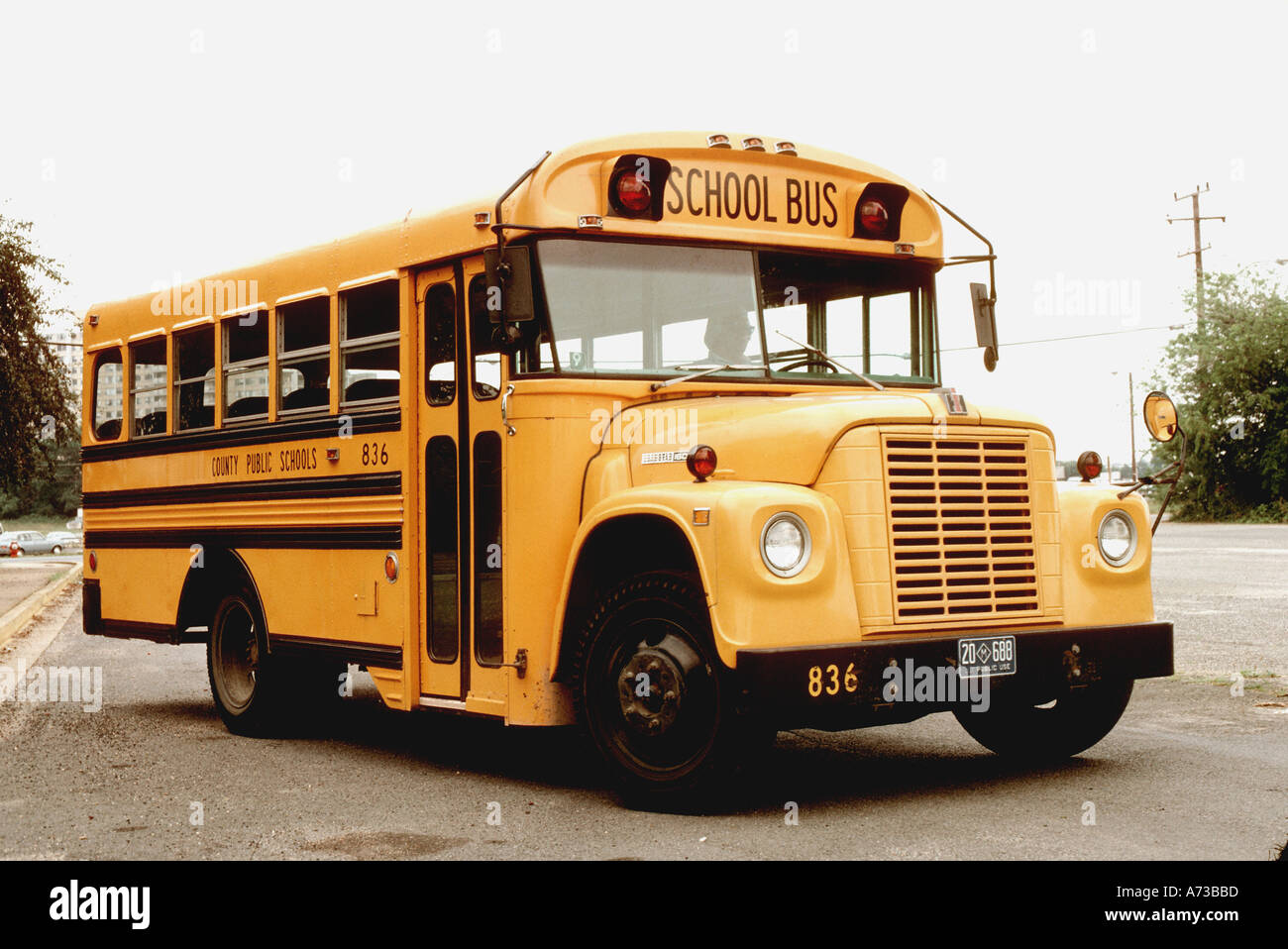 WASHINGTON, DC, USA Vintage American Public School, Ford Bus in Suburbs, Street Scene, Transportation Stock Photo