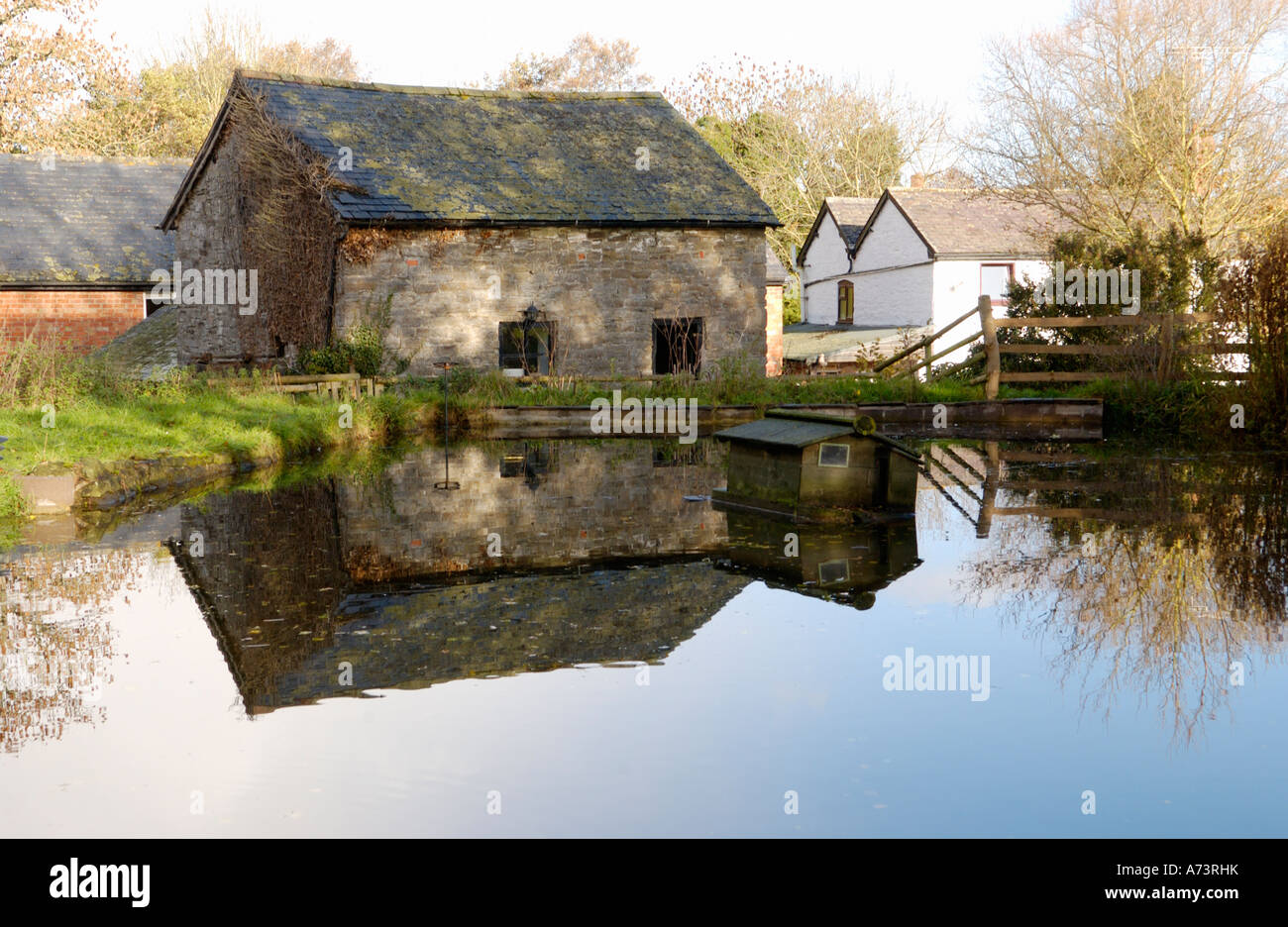 Mill pond and Bacheldre Watermill Churchstoke Montgomery Powys Mid