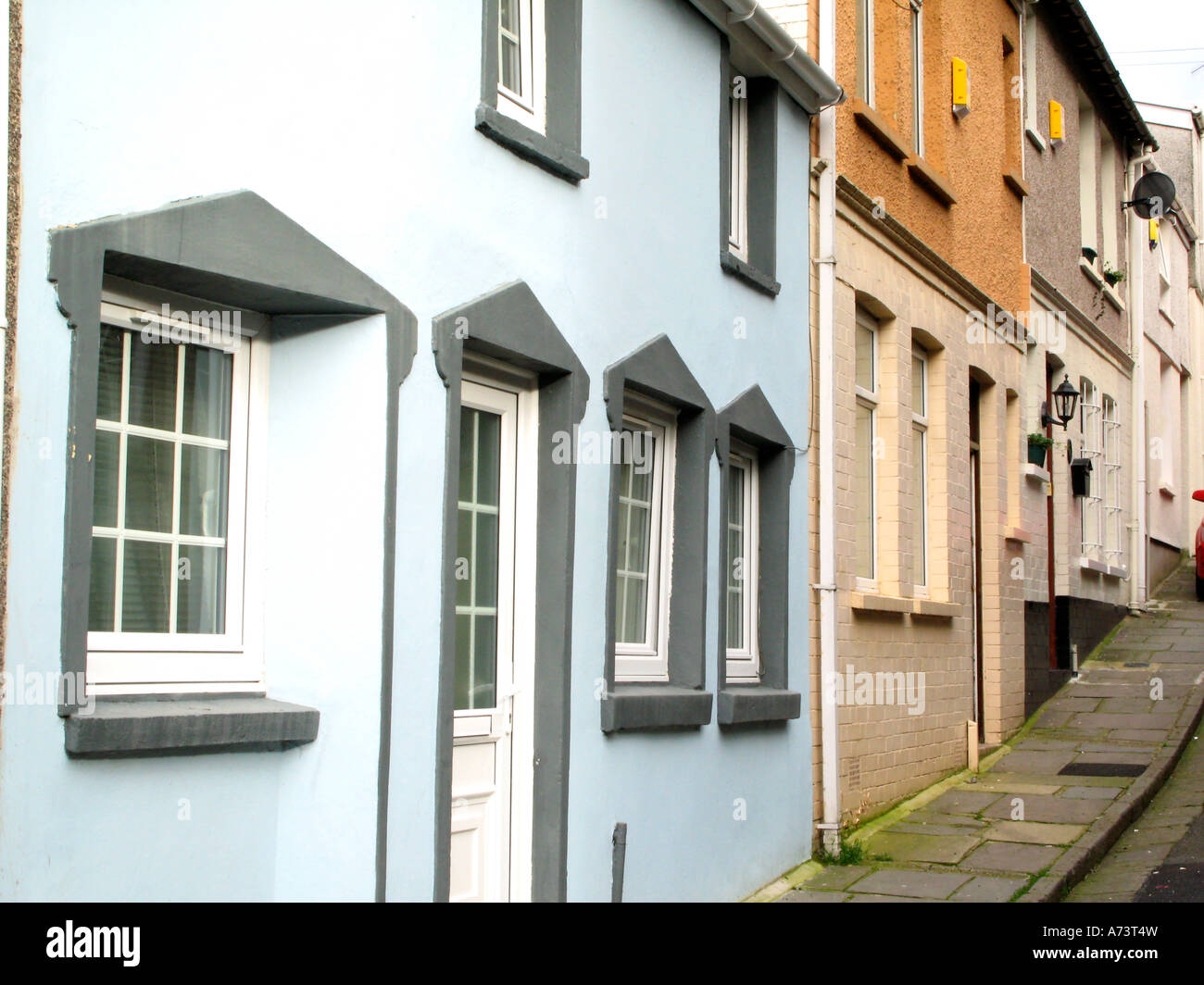 Traditional terraced houses dating from late 19th century in town centre of Merthyr Tydfil South Wales UK Stock Photo