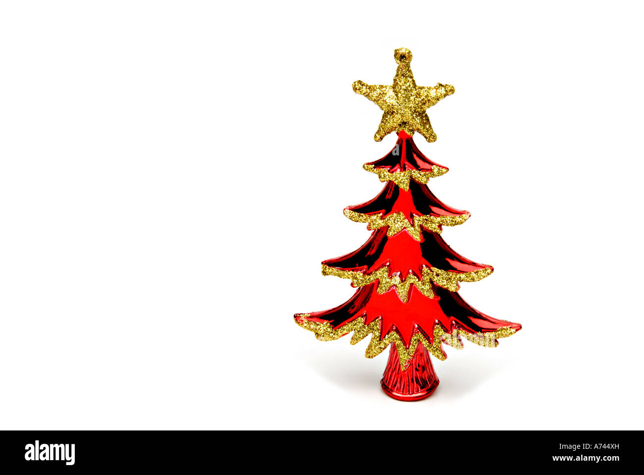 Ornamental christmas tree with gold star, space for copy Stock Photo