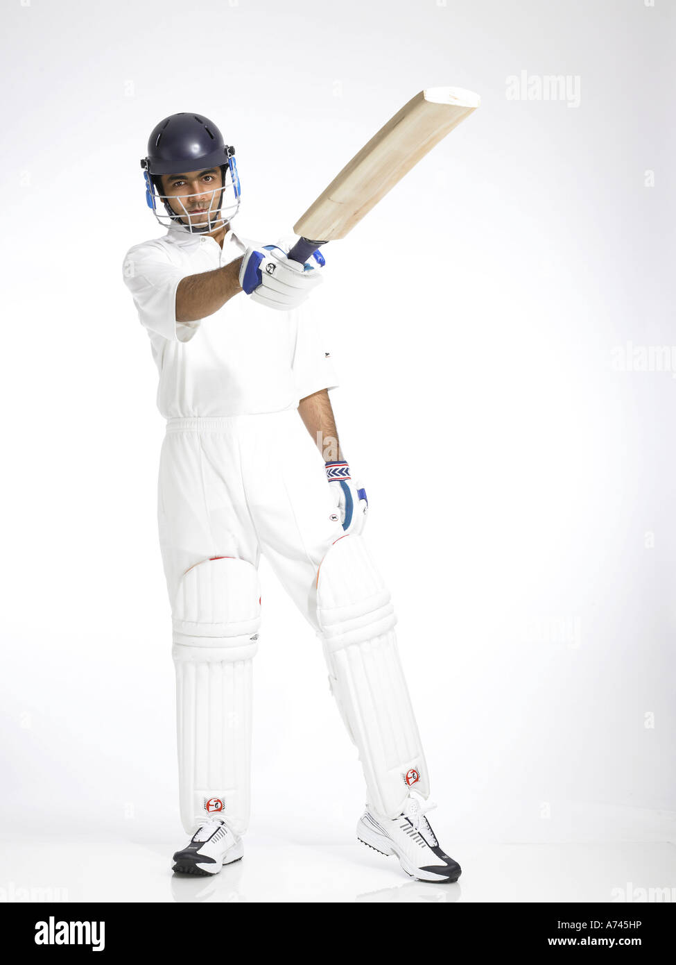 VDA 201775 Indian batsman raising bat for good score in cricket match