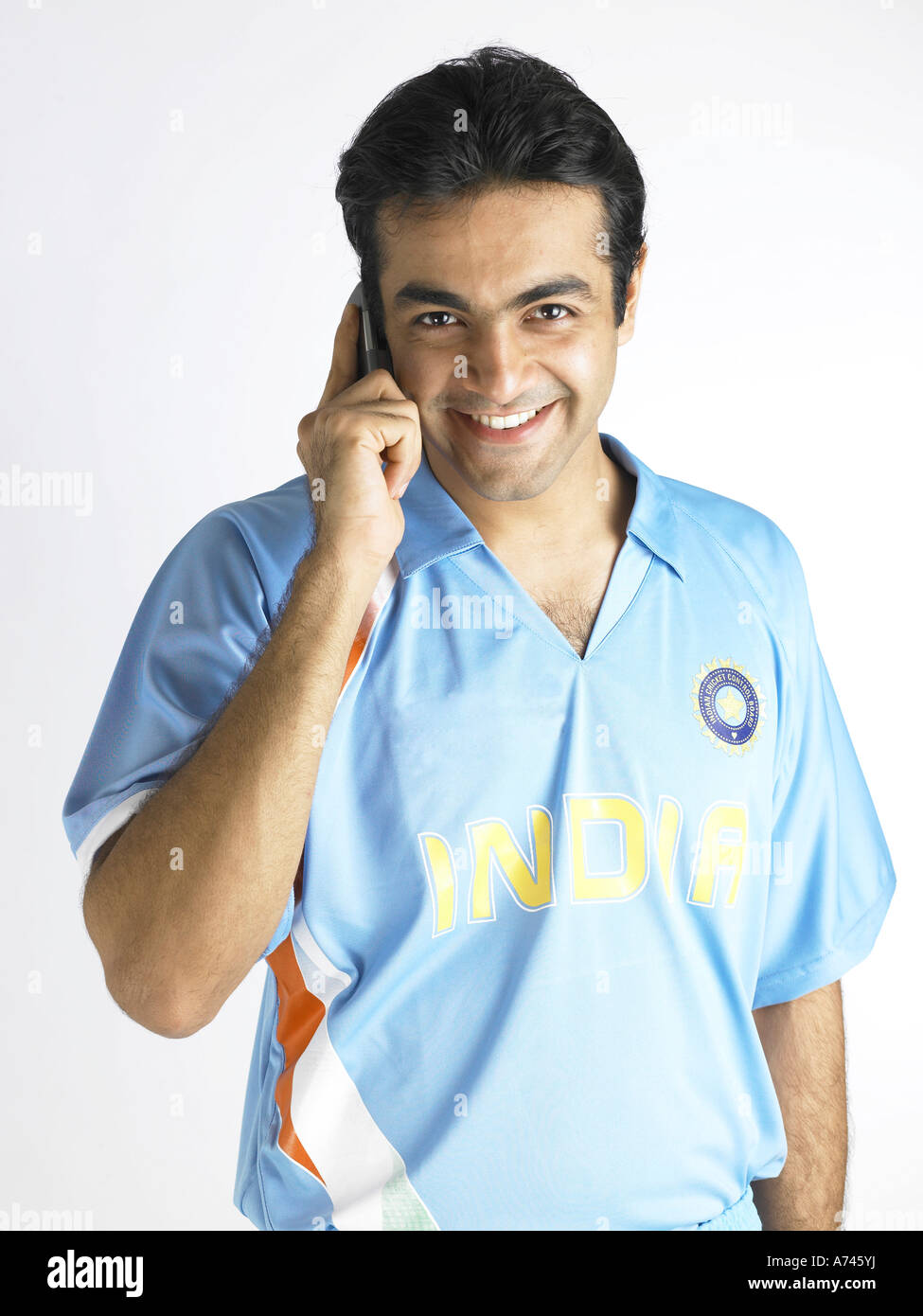 VDA 201865 Indian cricket player talking on mobile phone MR 702A Stock