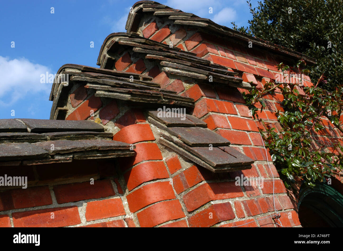 another brick in the wall interesting but overly complex wall coping Stock  Photo - Alamy