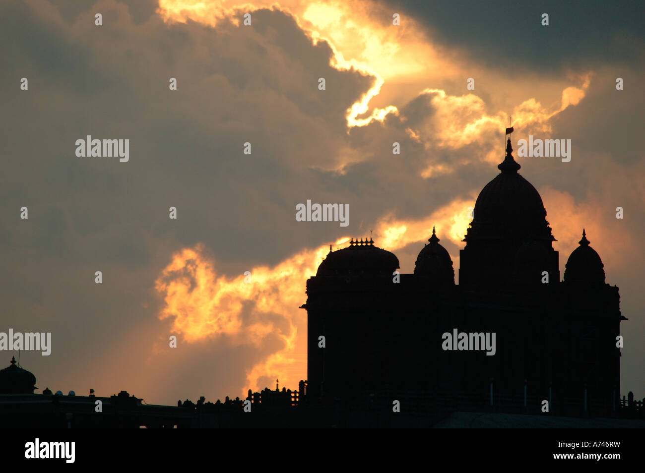 sun rise,beach, dawn,  sunrise, water, Outer,  colorful, ocean, sea, vertical,Vivekananda temple,temple,temple fire,cloud,sun, Stock Photo