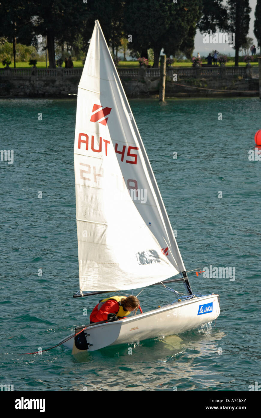 Dinghy sailing on Lake Garda Stock Photo Alamy