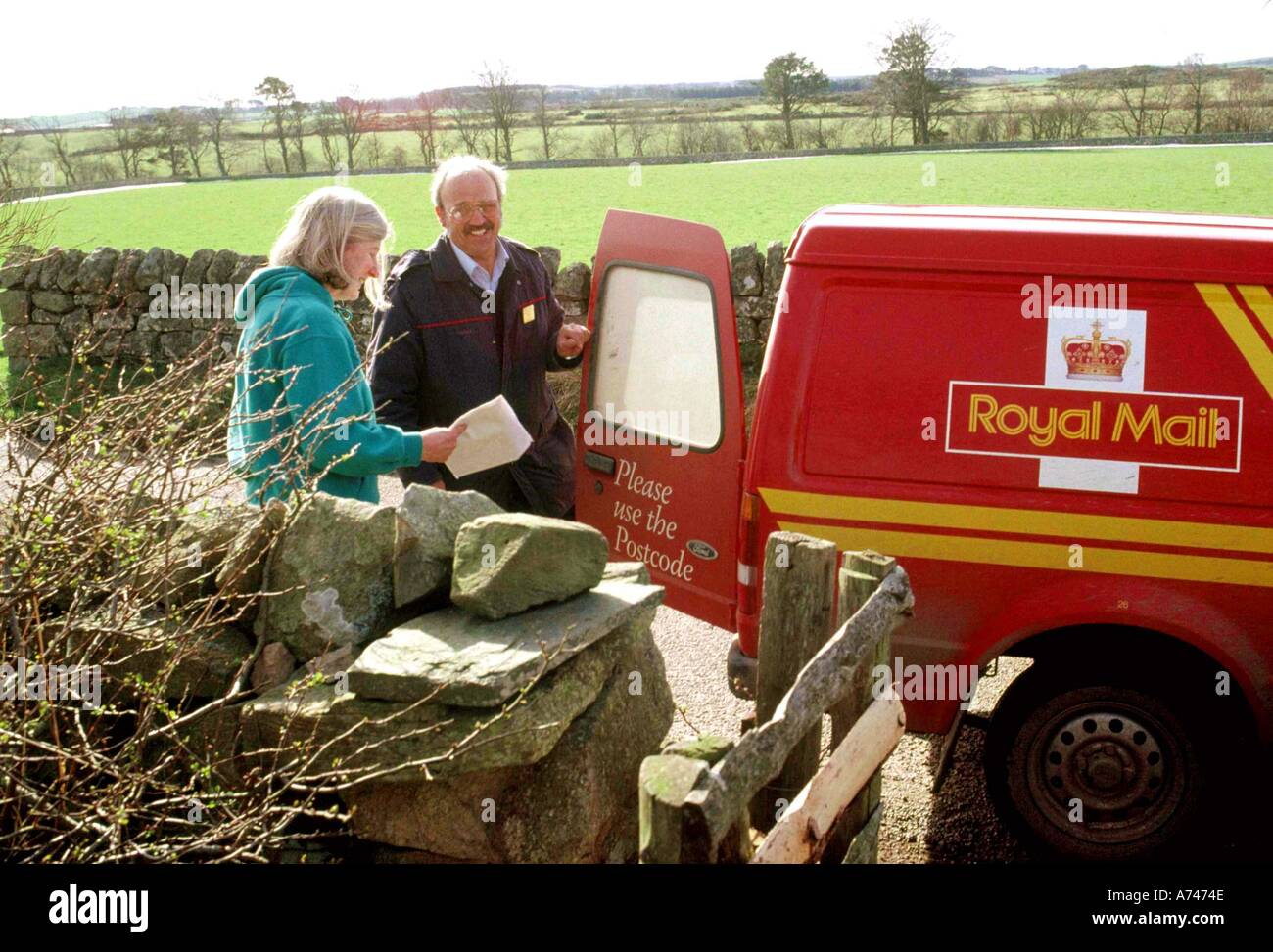 Post office van delivering post to someone in the countryside Stock Photo