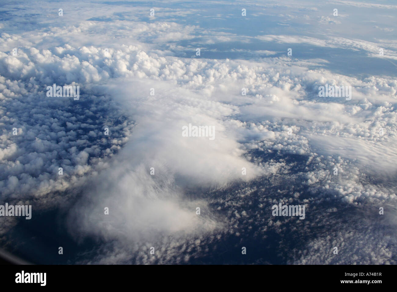 Above fluffy clouds blue sky hi-res stock photography and images - Alamy