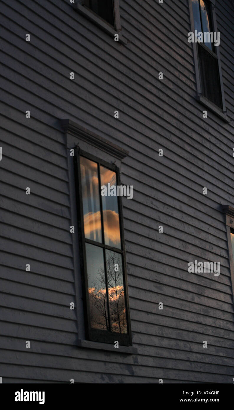 Moody photograph of a window with cloud reflection, Block Island Rhode