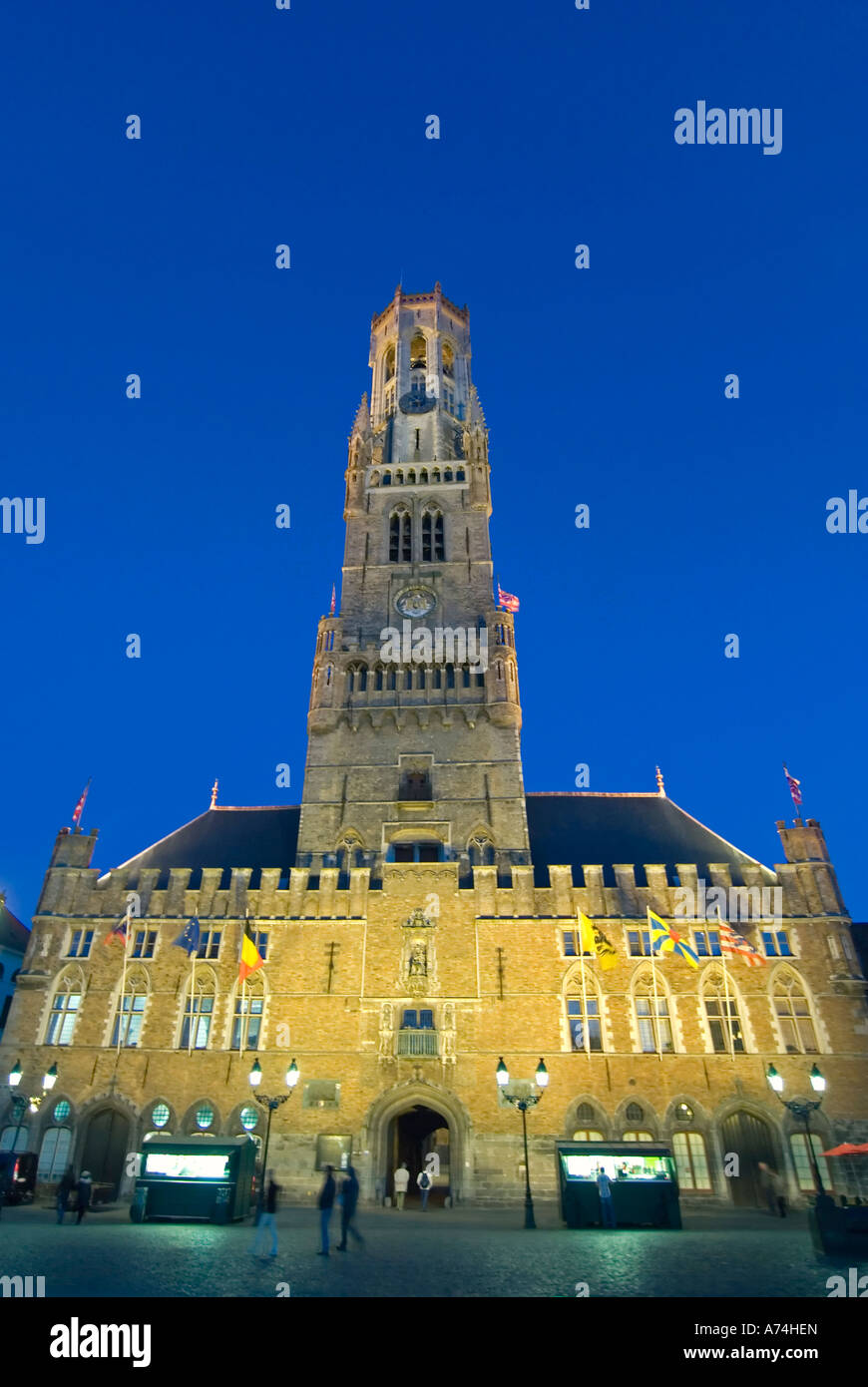 Vertical cityscape of the Belfry of Bruges or Belfort van Brugge in the  Markt [Market Place] illuminated at night in Bruges Stock Photo - Alamy