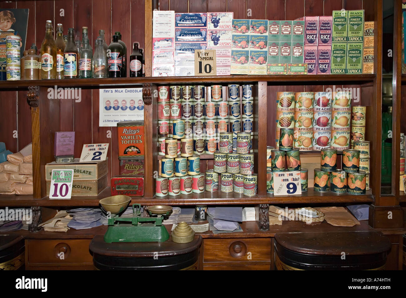 Museum display of 1920s food and traditional weighing scales St Fagans Wales UK Stock Photo