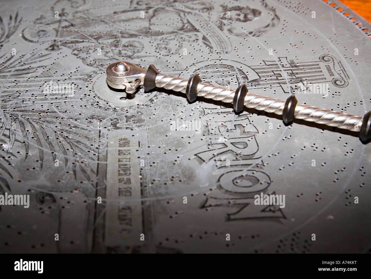 Early mechanical musical instrument with rotating record which produced