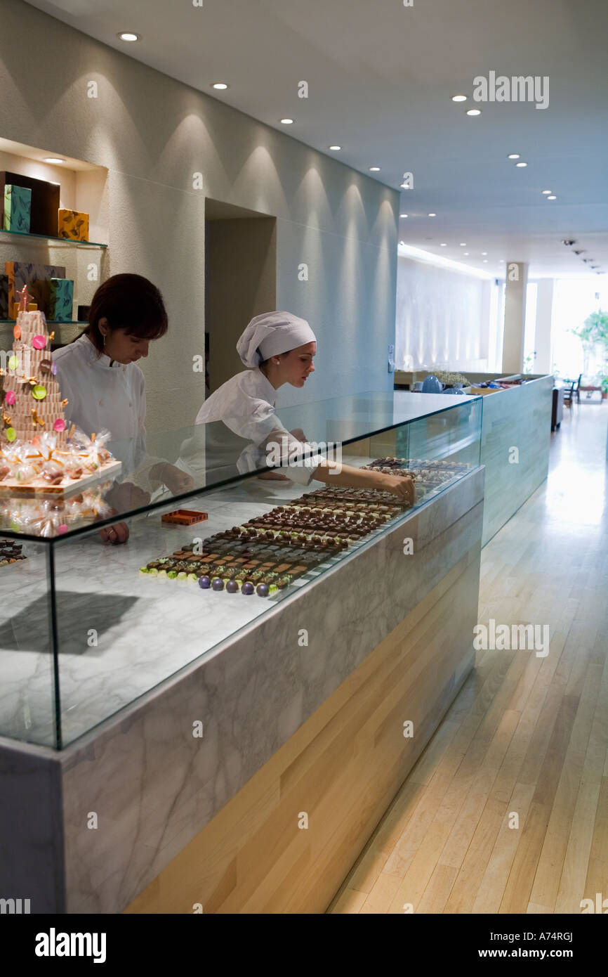 Bakers in candy store Stock Photo Alamy