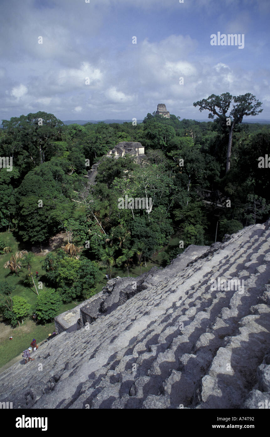 Central America, Guatemala, Tikal. climbing pyramid Stock Photo Alamy