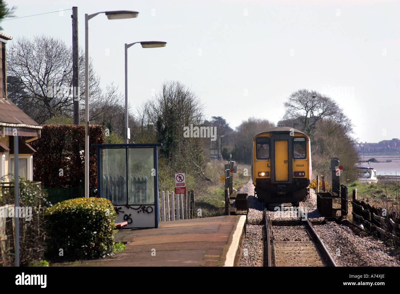 A train approaches Exton station between Exeter and Exmouth Stock Photo