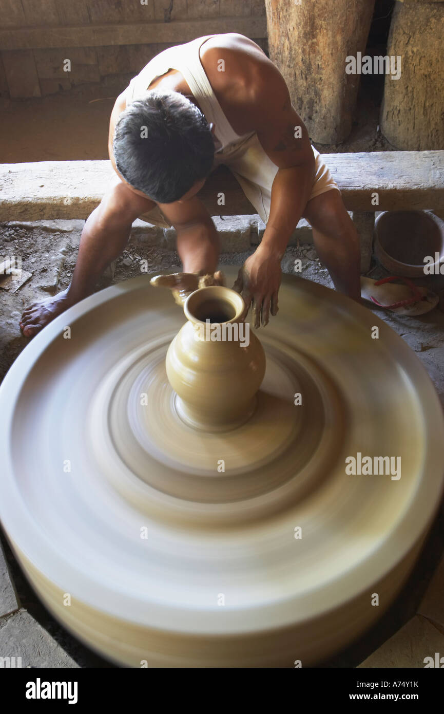 Man Making Pot On Potters Wheel Stock Photo Alamy