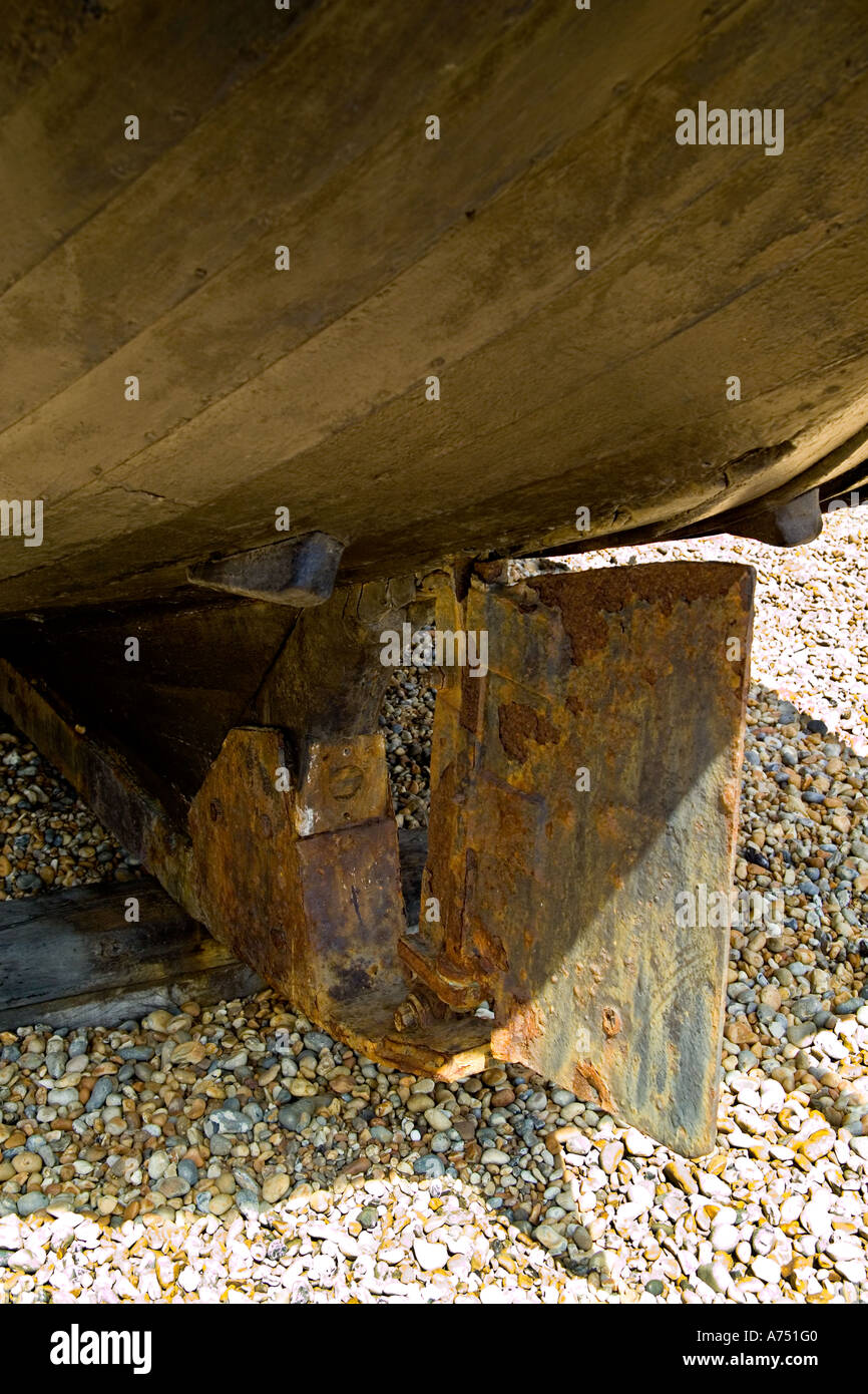 Old Rudder and Pebbles Stock Photo