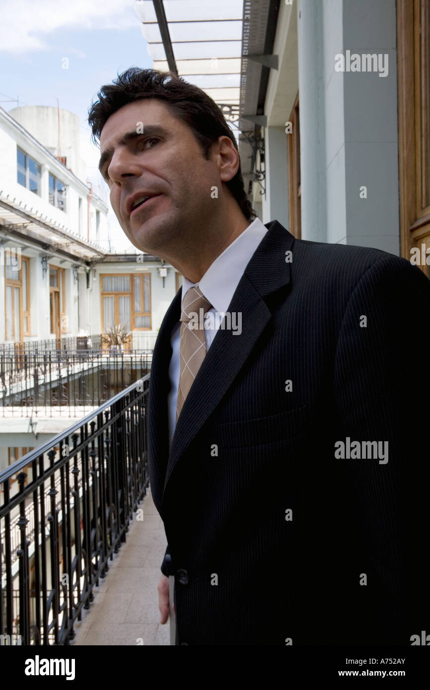 Businessman standing outdoors Stock Photo - Alamy