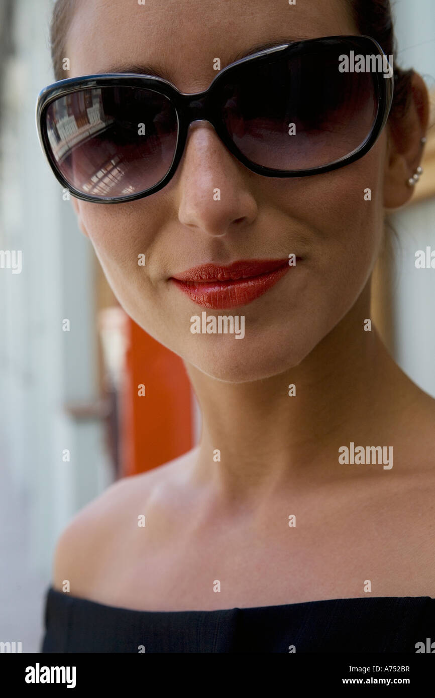 Woman wearing oversized sunglasses Stock Photo Alamy
