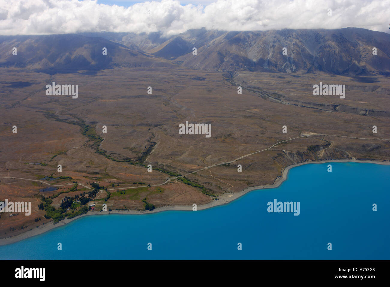 Aerial view over Lake Tekapo showing the southern alps, southern isalnd New Zealand. Stock Photo