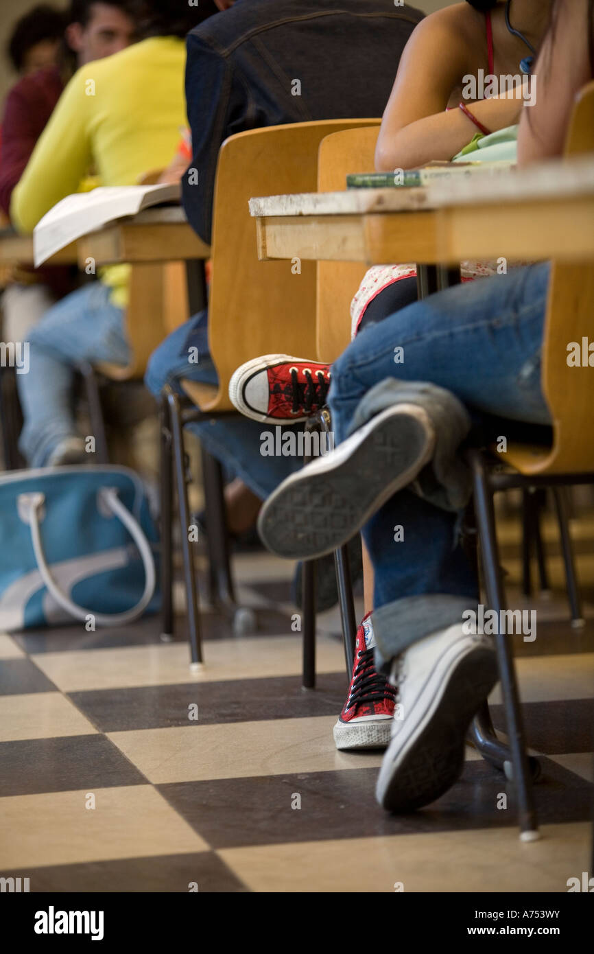 Students sitting at desks in classroom Stock Photo - Alamy