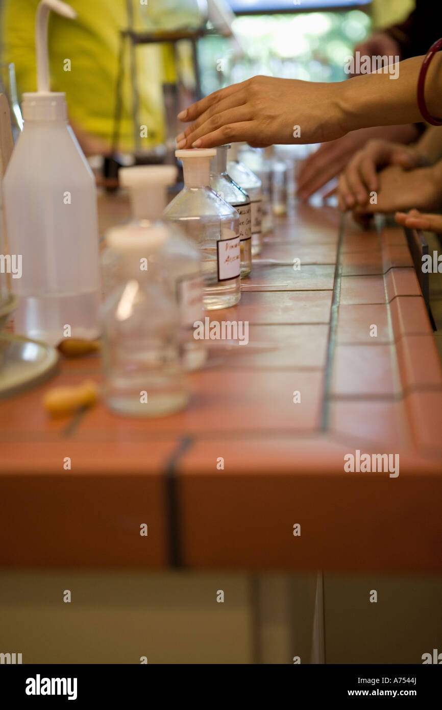 Jars of chemicals on desk Stock Photo Alamy