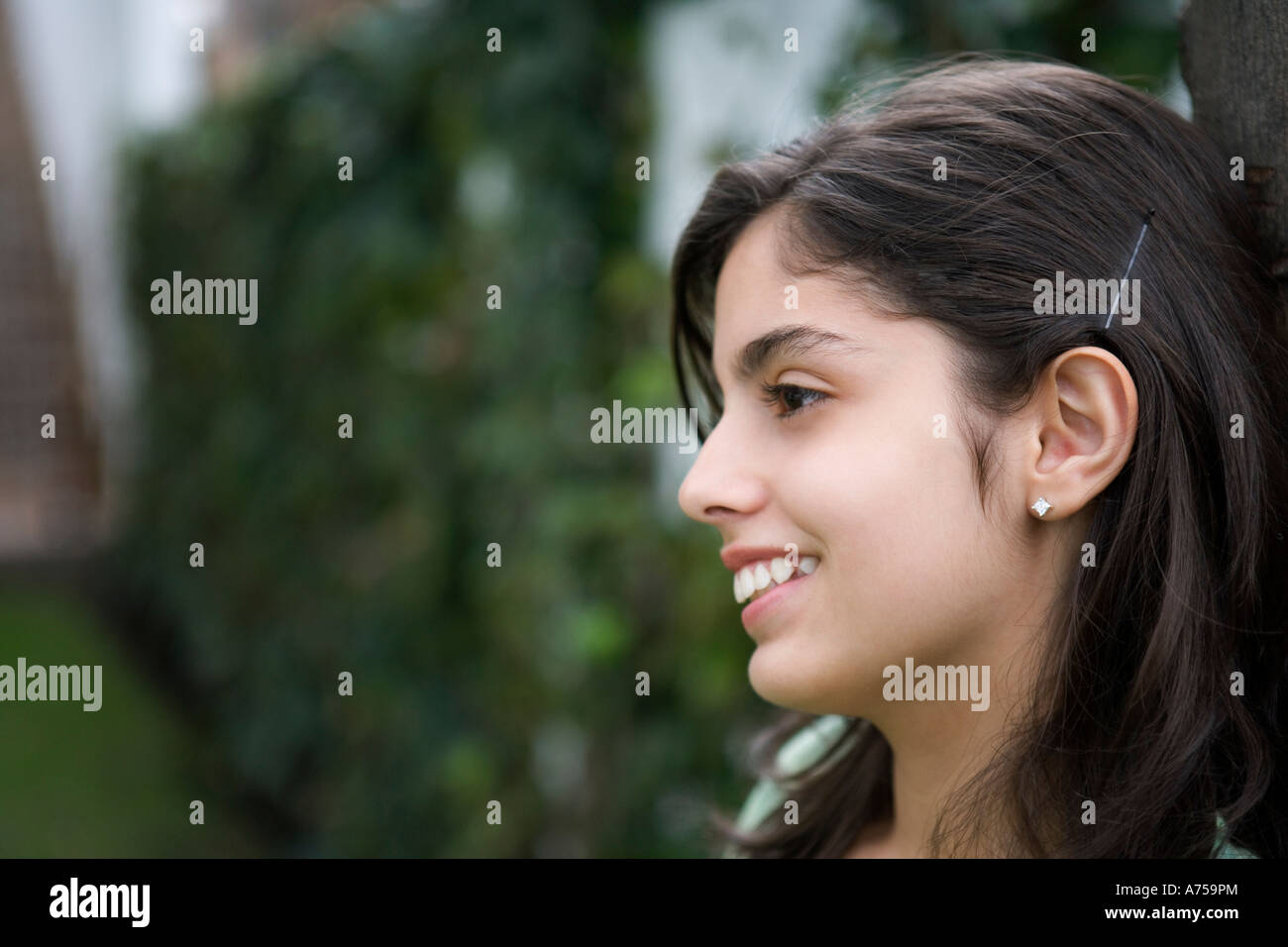 Young girl smiling Stock Photo - Alamy