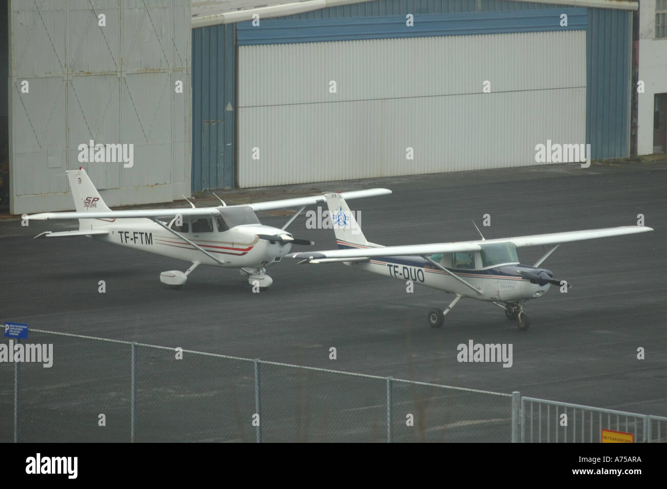 Executive Cessnas on runway of Hotel Loftleidir Iceland Stock Photo