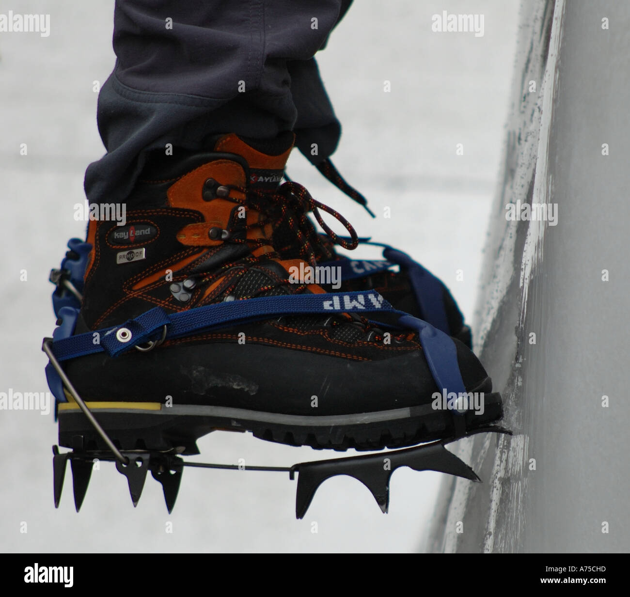 Ice climbing at Somerset House with full body harness and crampons and