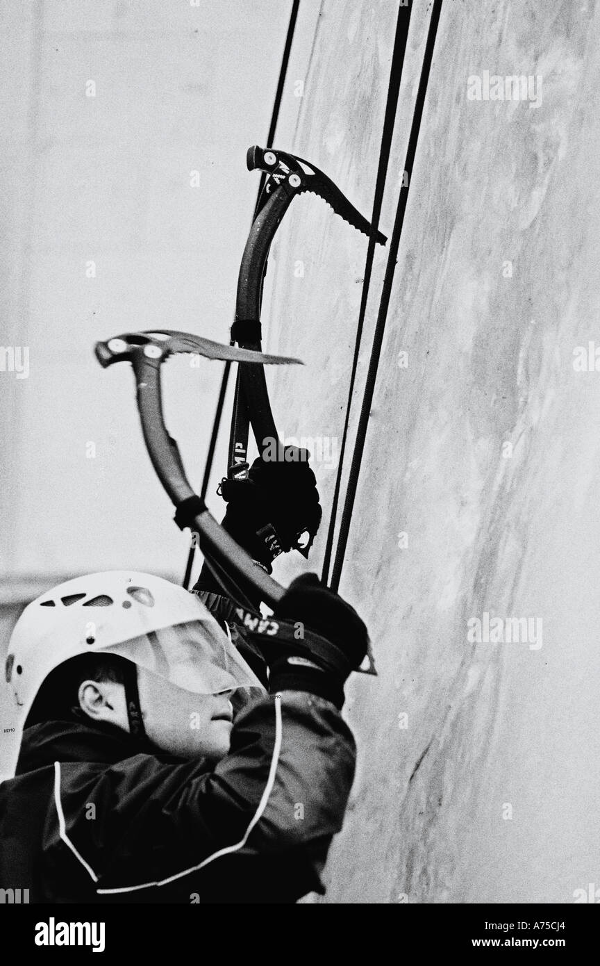 Ice climbing at Somerset House with full body harness and crampons and