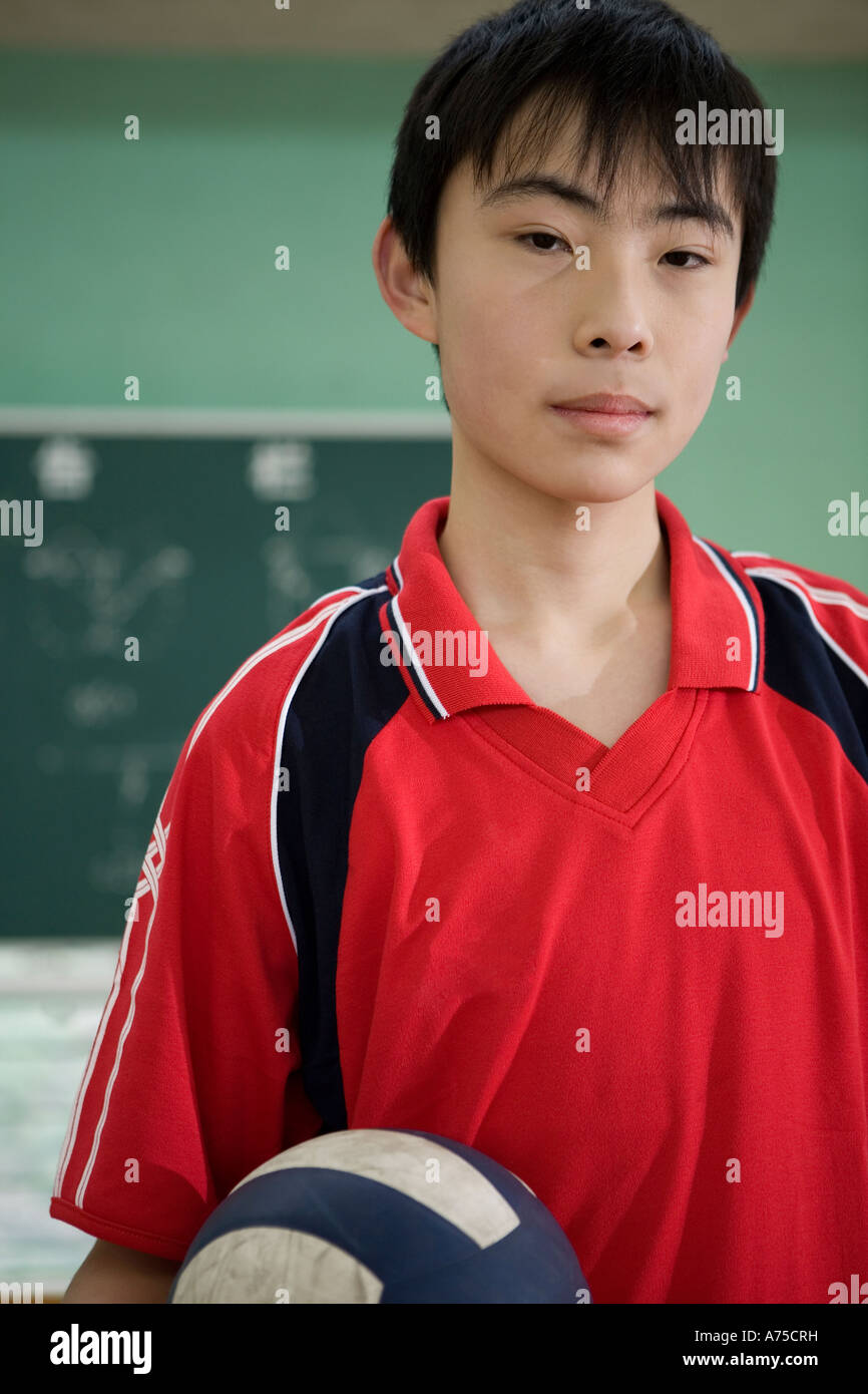 Male volleyball player holding volleyball Stock Photo Alamy