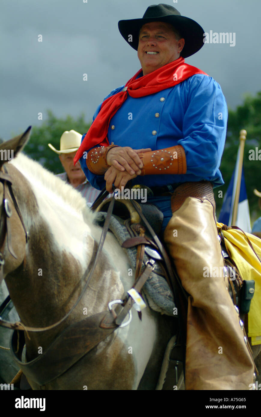 A cowboy riding a horse in Bandera Texas Stock Photo Alamy