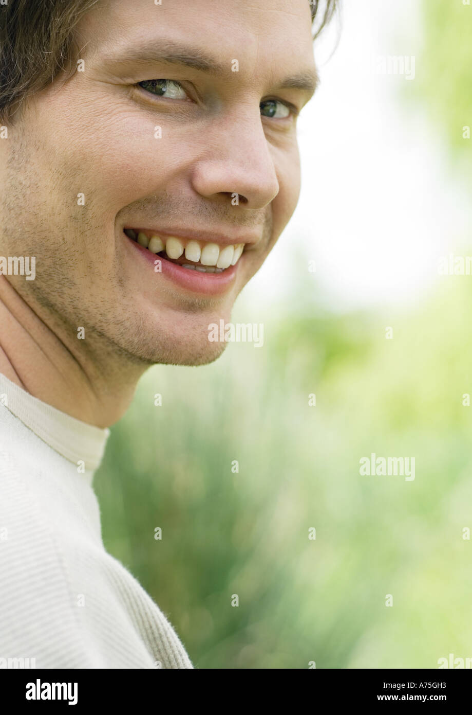 Young man smiling, portrait Stock Photo