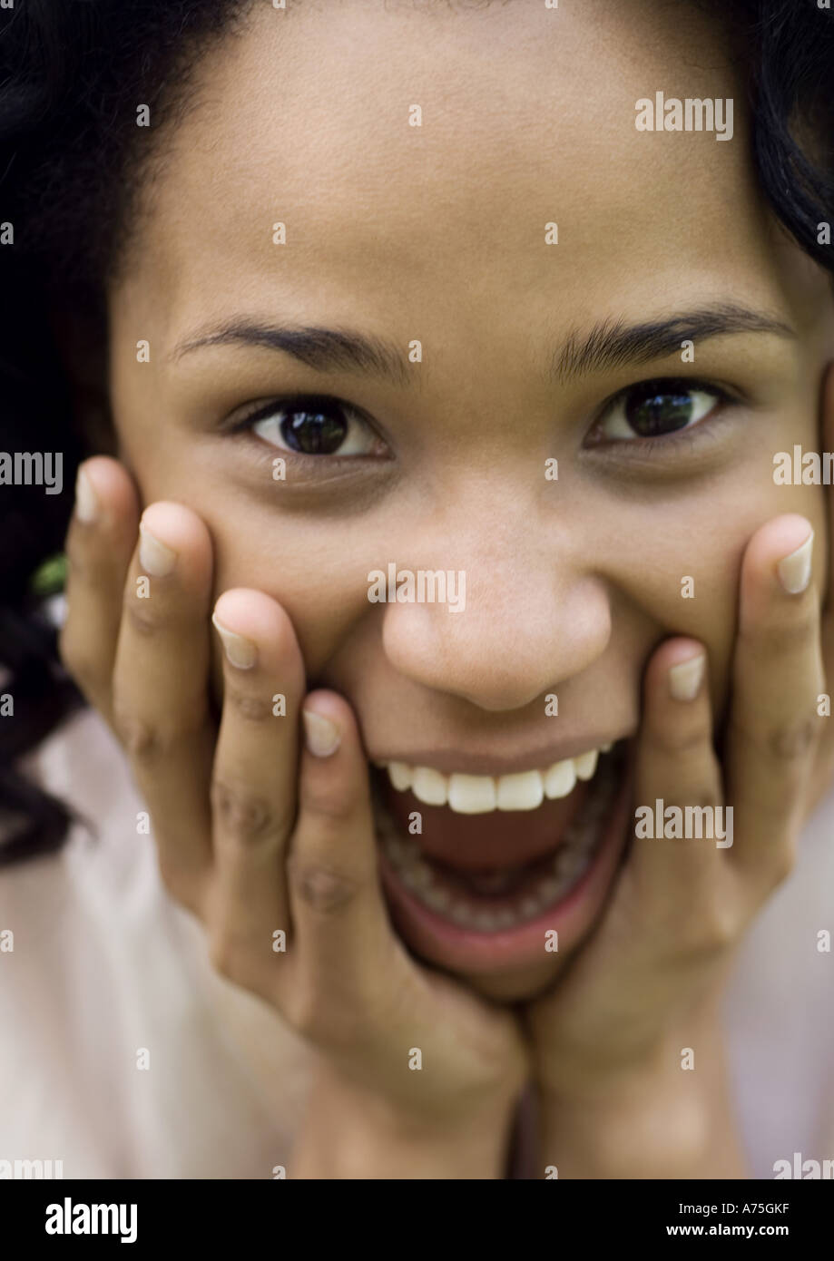 Young woman with surprised expression Stock Photo