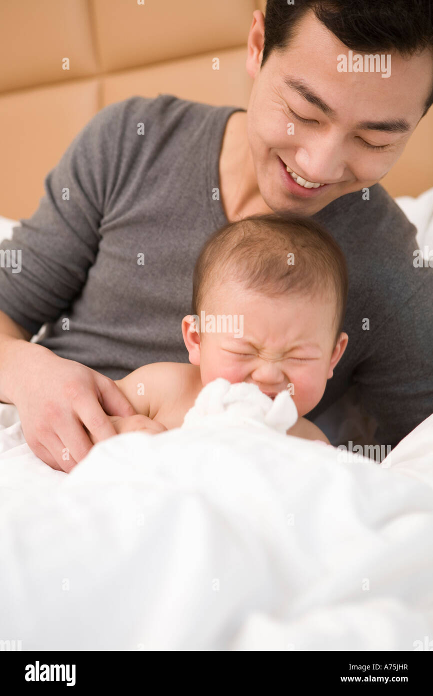 Father Comforting His Crying Baby Stock Photo 11731762 Alamy