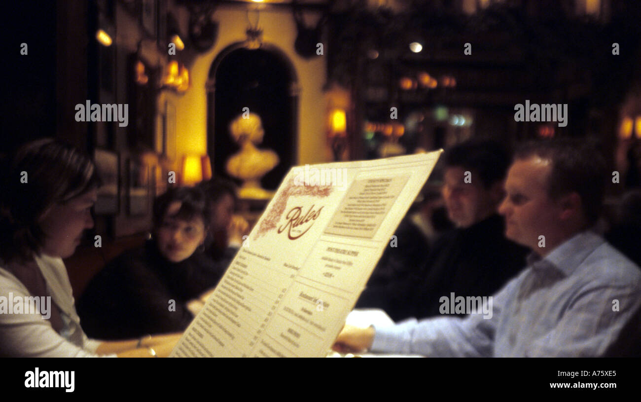 Menu and diners Rules restaurant maiden lane covent garden london UK eu europe Stock Photo