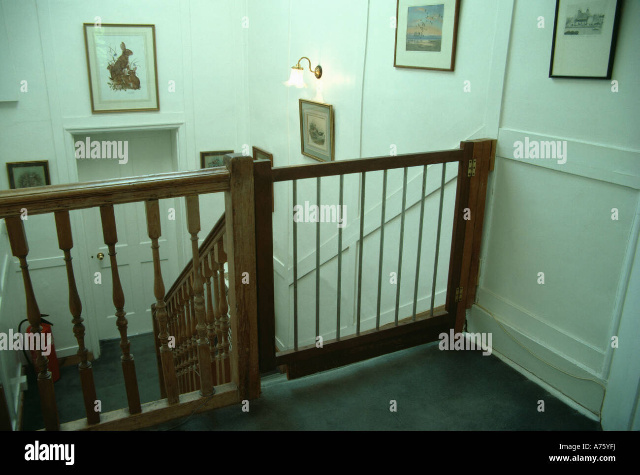 Safety gate at top of stairs Stock Photo Alamy