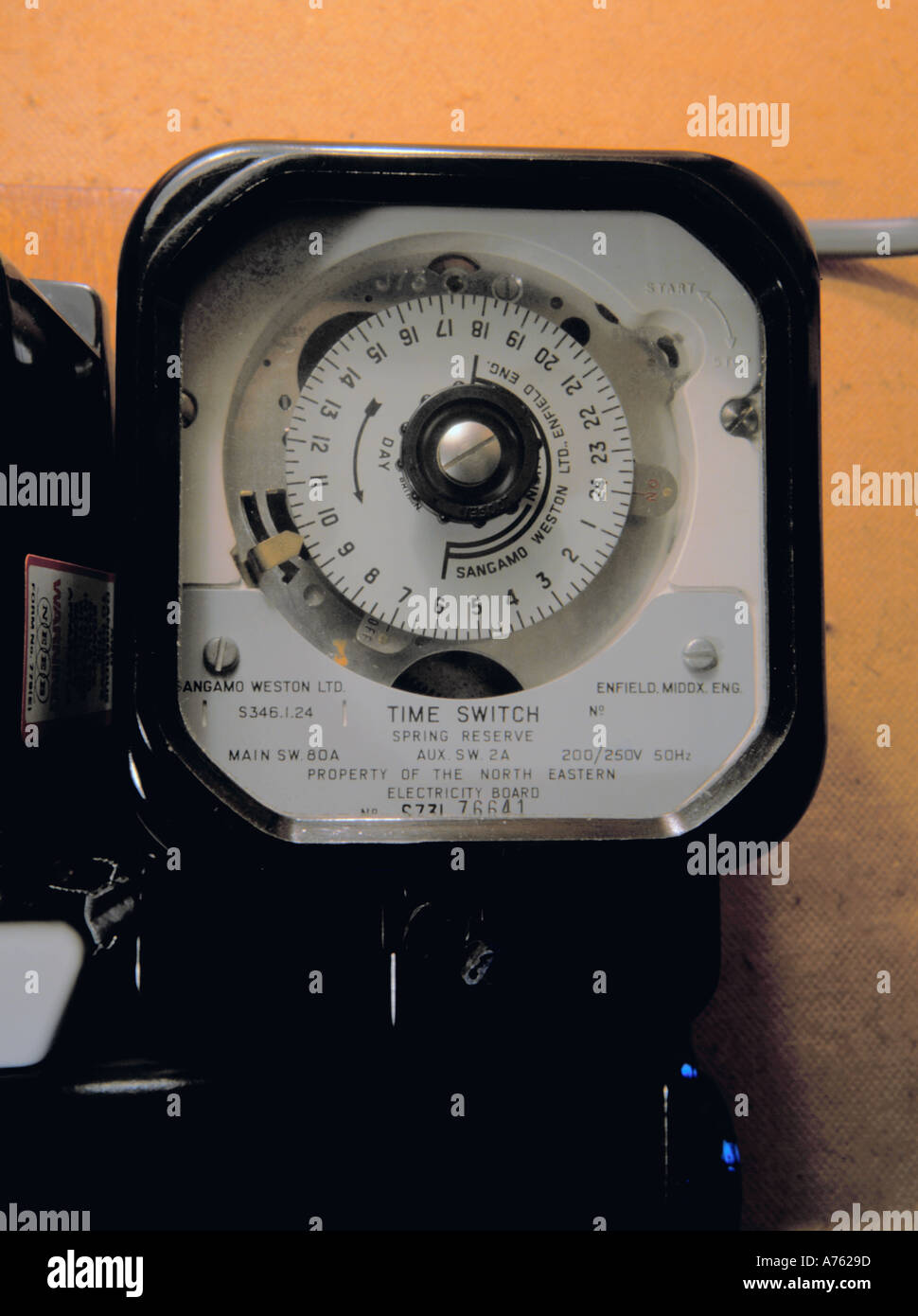 Electrical clock timer for tripping the supply of off peak electricity