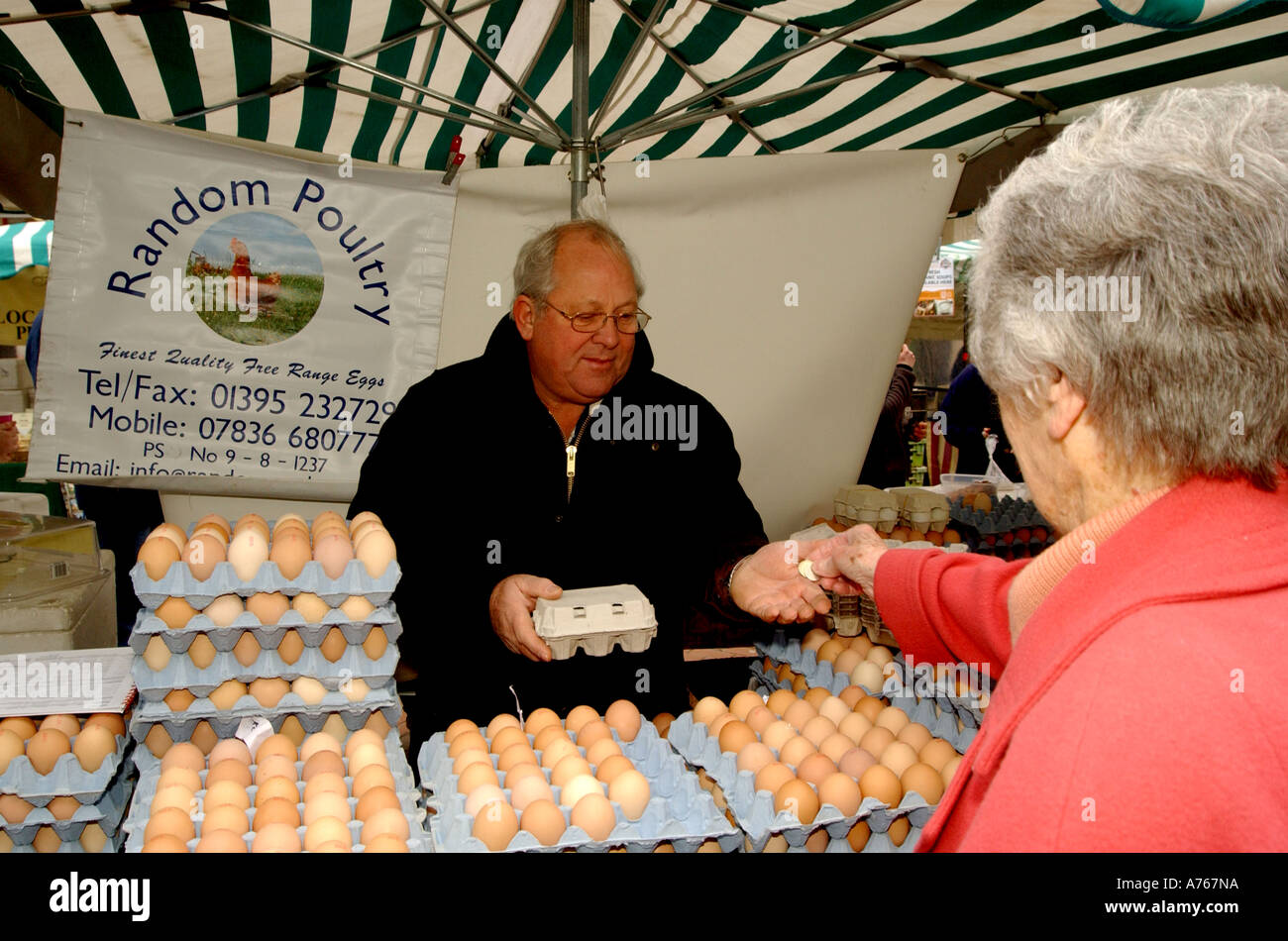 Egg farmer at Exeter market Stock Photo