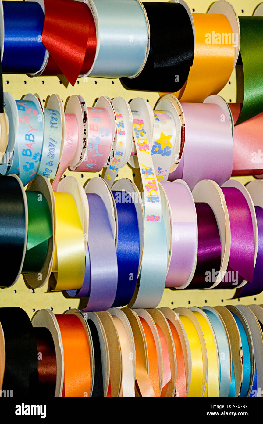 Colorful rack of ribbons at a party supply store Stock Photo - Alamy