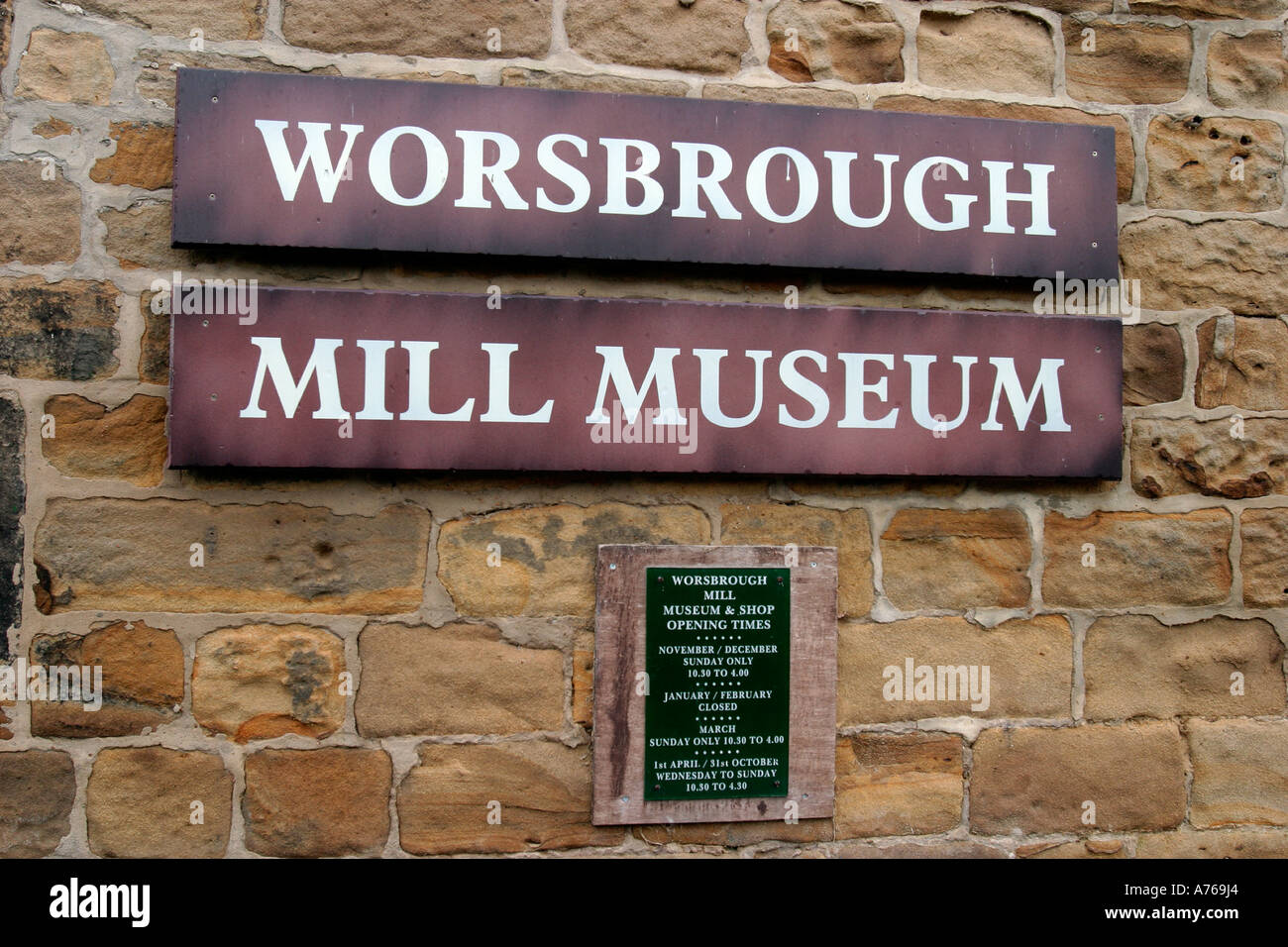 Sign on stone wall for Worsbrough Mill Museum Stock Photo Alamy
