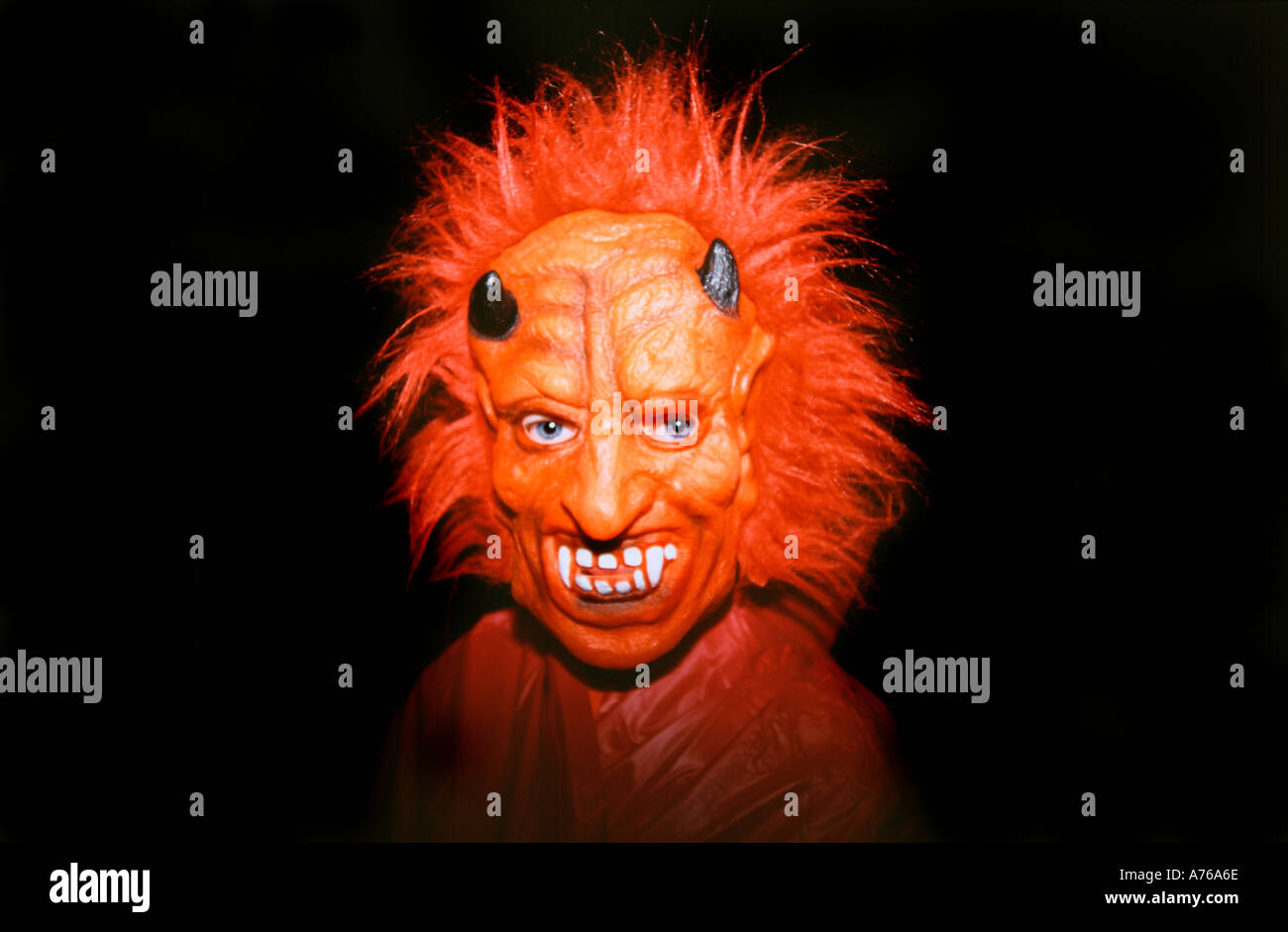 Boy aged 8 dressed as devil for halloween Stock Photo